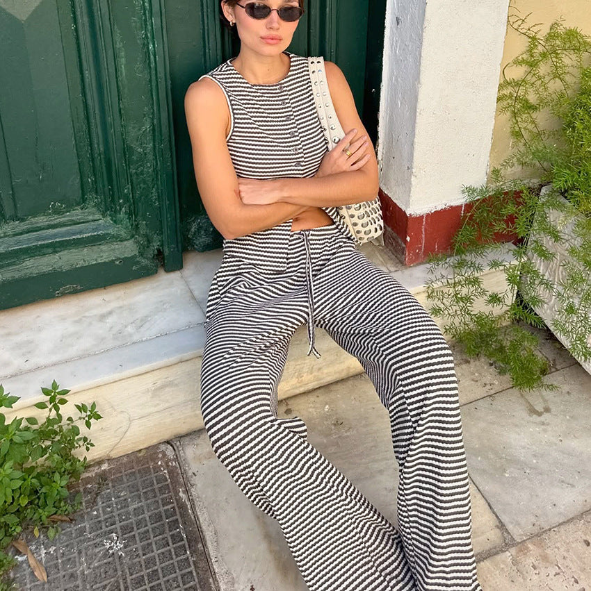 Dame casual jumpsuit med diskret stribemønster og praktiske lommer Stilla