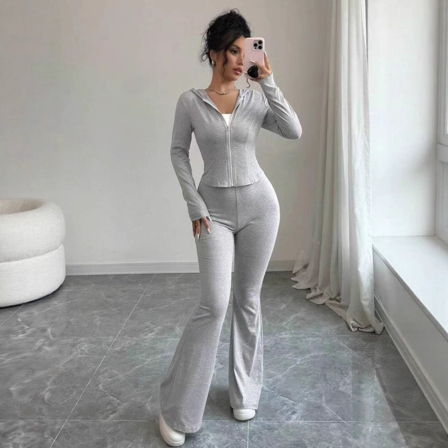 Dame Sporty Jumpsuit i elastisk materiale med lynlås Stilla