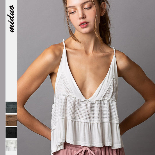 Dame afslappet flæse-top med V-udskæring og justerbare spaghettistropper Stilla