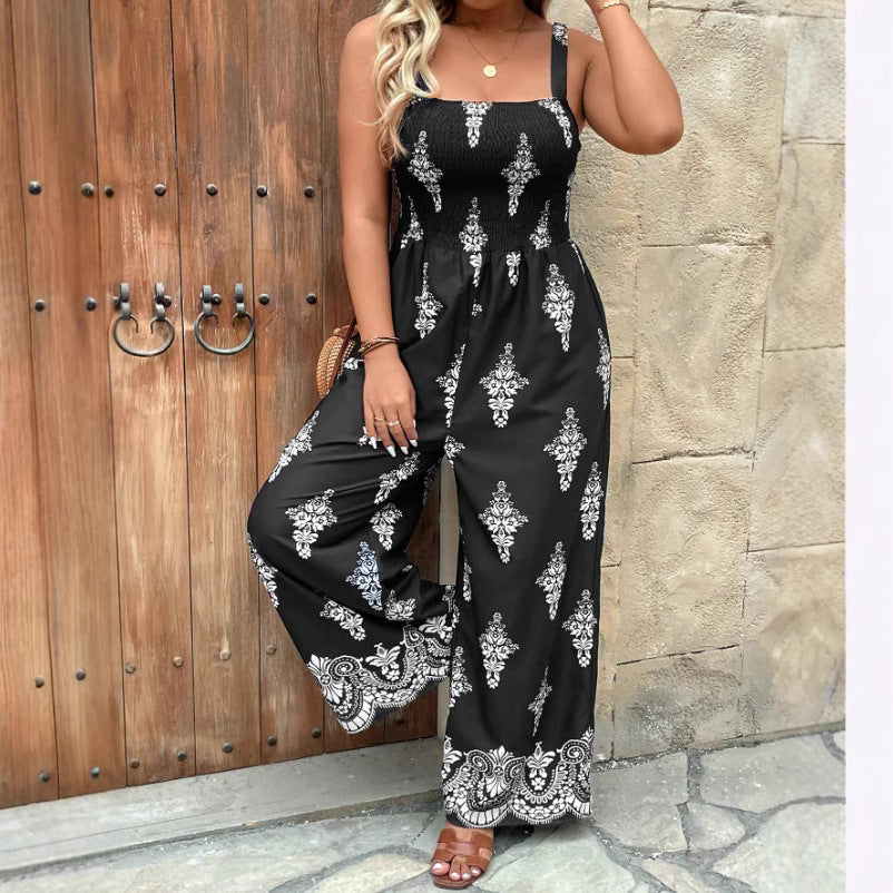 Dame jumpsuit med elegant blomstret design og bredt ben Stilla