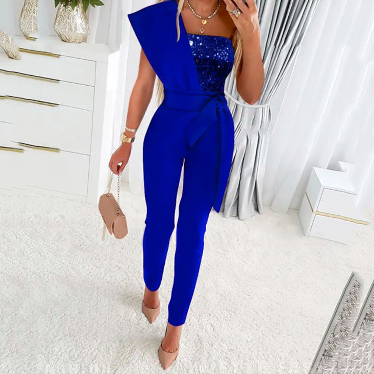 Dame elegant jumpsuit med asymmetrisk snit og glitrende overdel Stilla
