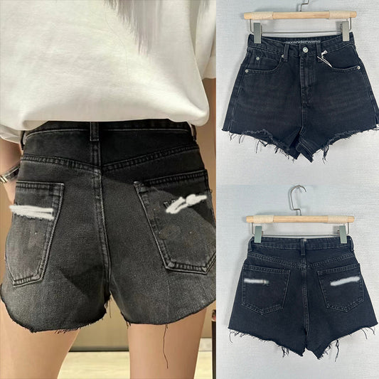 Dame Destroyed Denim-Shorts med høj talje og frynser Stilla
