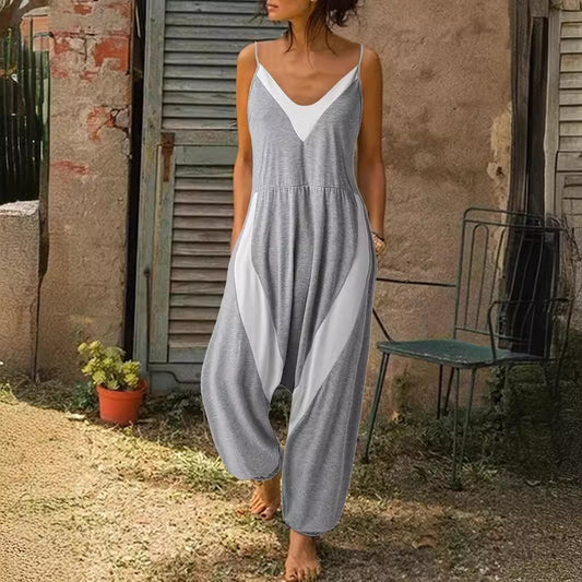 Dame løs jumpsuit med dyb V-udskæring og sidelommer Stilla
