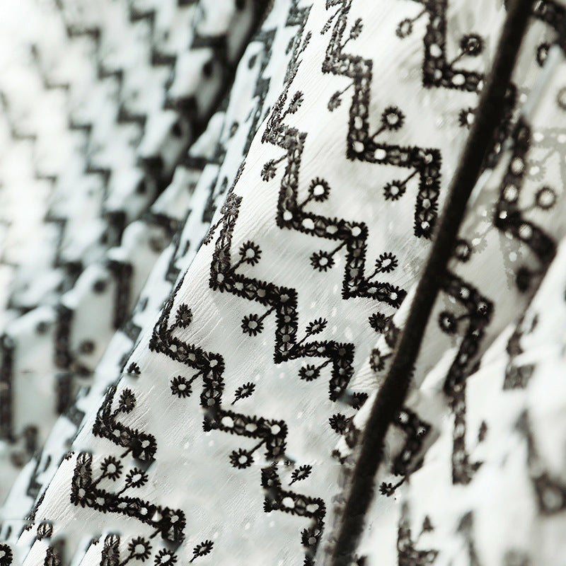 Dame afslappet hættetrøje med geometrisk mønster og løs pasform Stilla