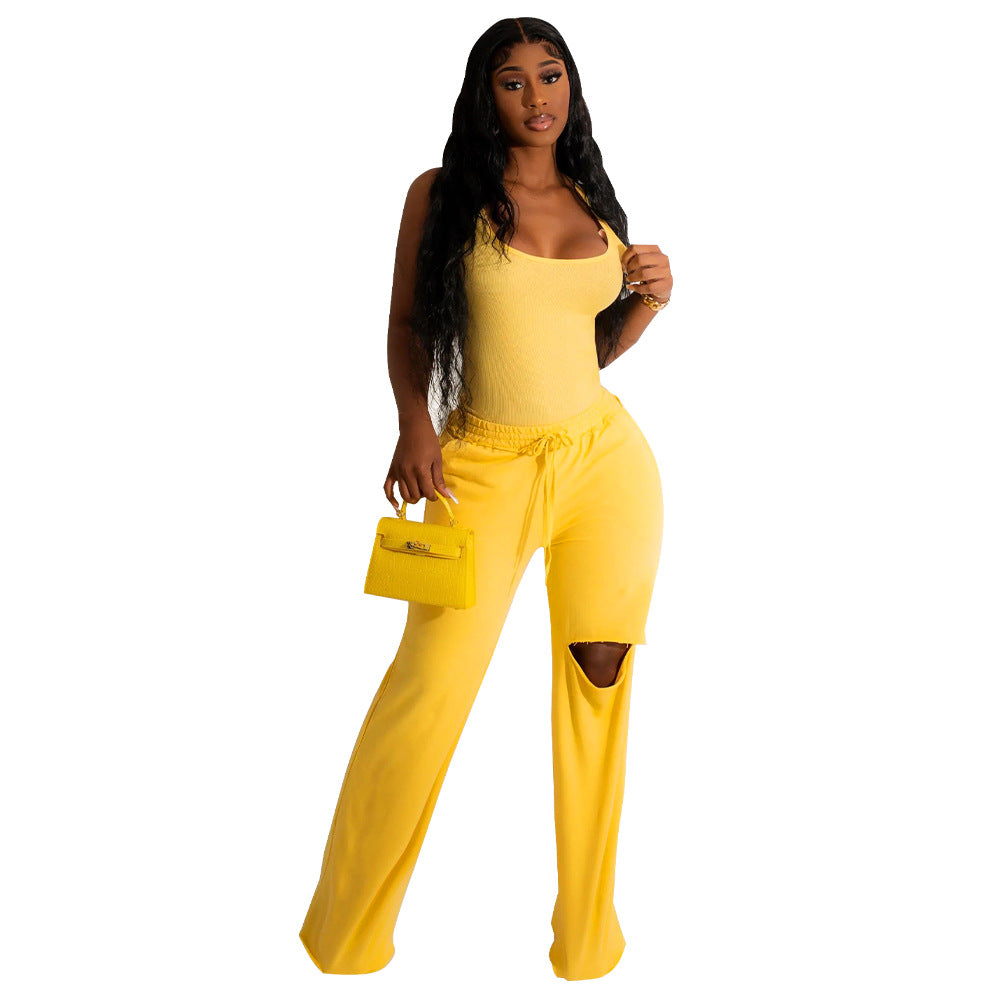 Dame Sporty Jumpsuit med høj talje og innovativ slidsdesign Stilla