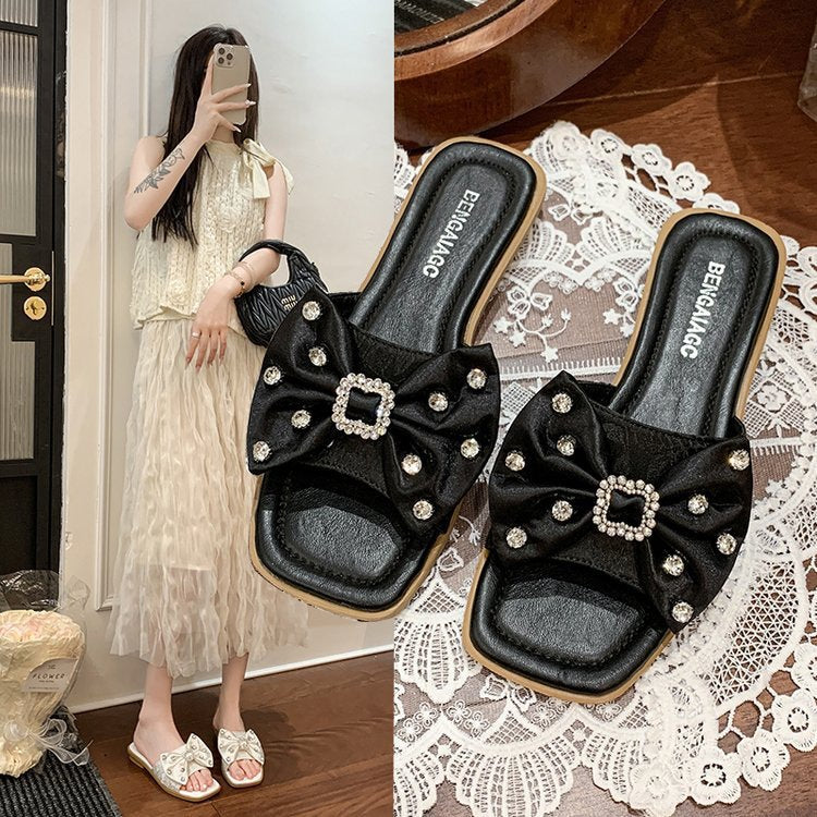 Dame Designer-sandaler med glamorøs sløjfedetalje og brusende strassdekorationer Stilla