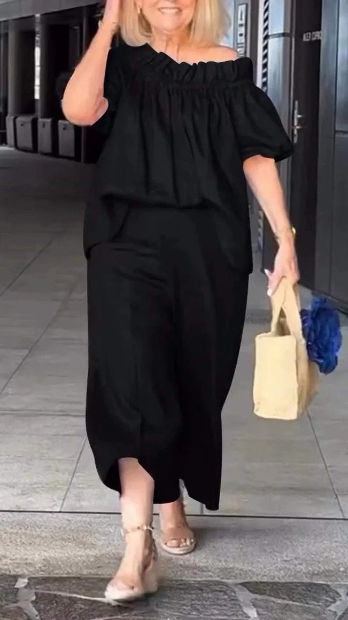 Dame luftig jumpsuit-sæt med voluminøse ærmer og raffineret taljering Stilla