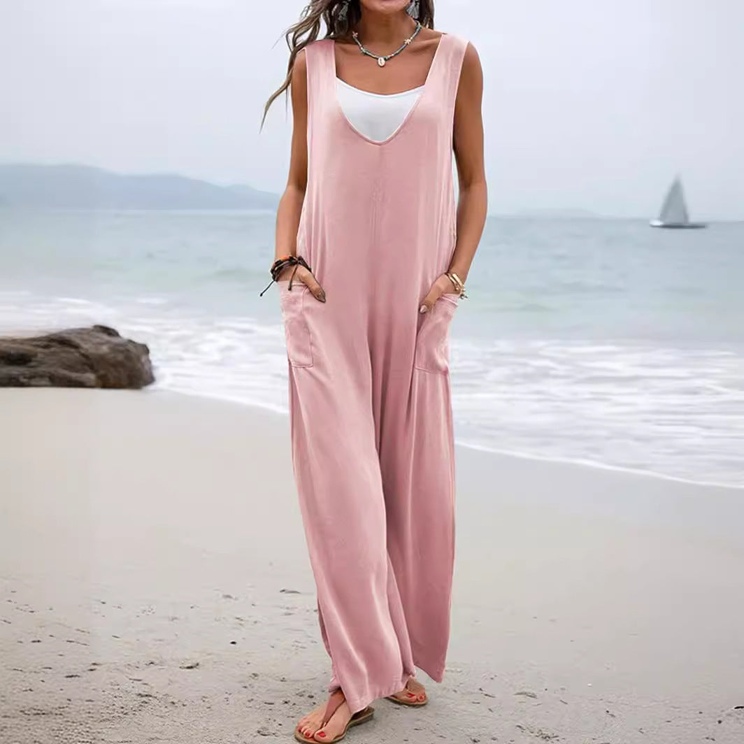 Dame afslappet jumpsuit med dyb V-udskæring og praktiske lommer Stilla