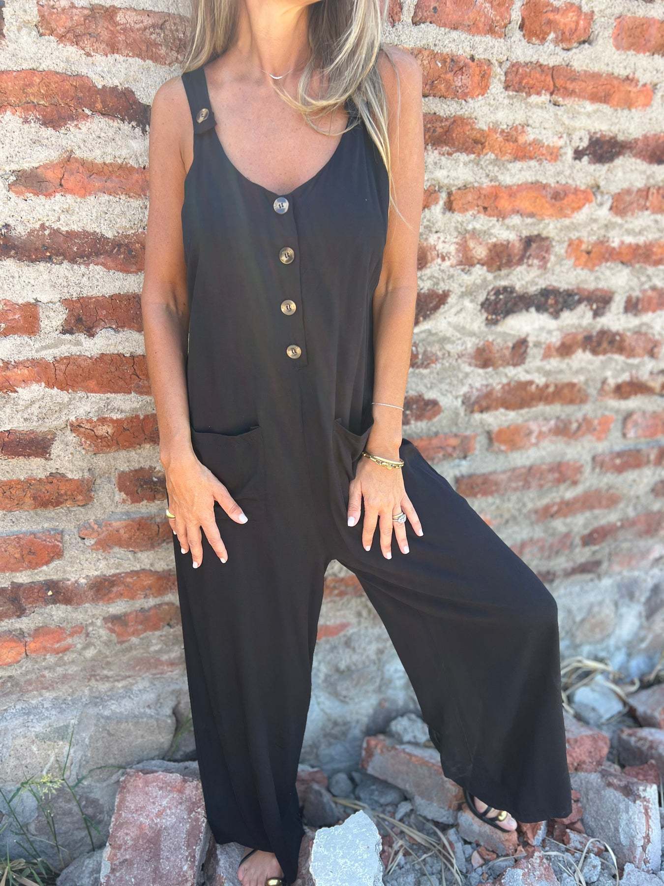 Dame jumpsuit med knaplukning og praktiske lommer Stilla