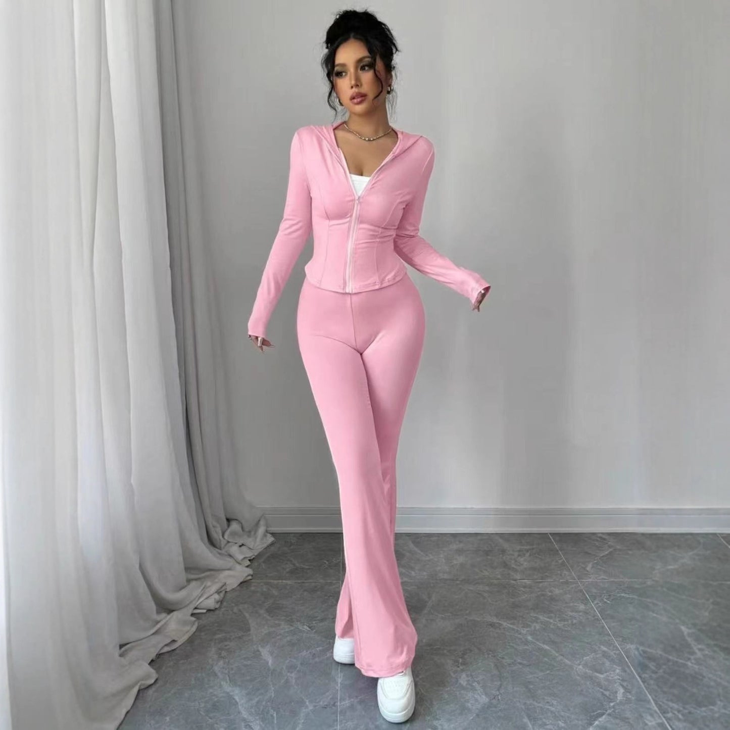 Dame Sporty Jumpsuit i elastisk materiale med lynlås Stilla