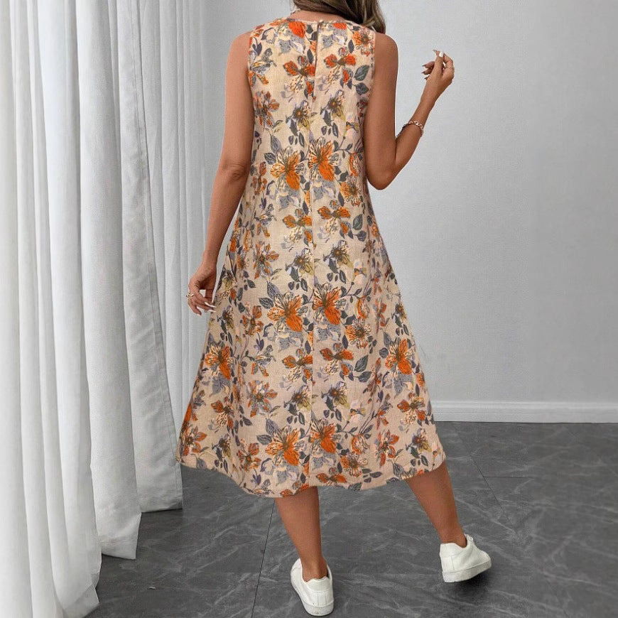 Dame afslappet blomsterkjole med lommer og svajende kant Stilla