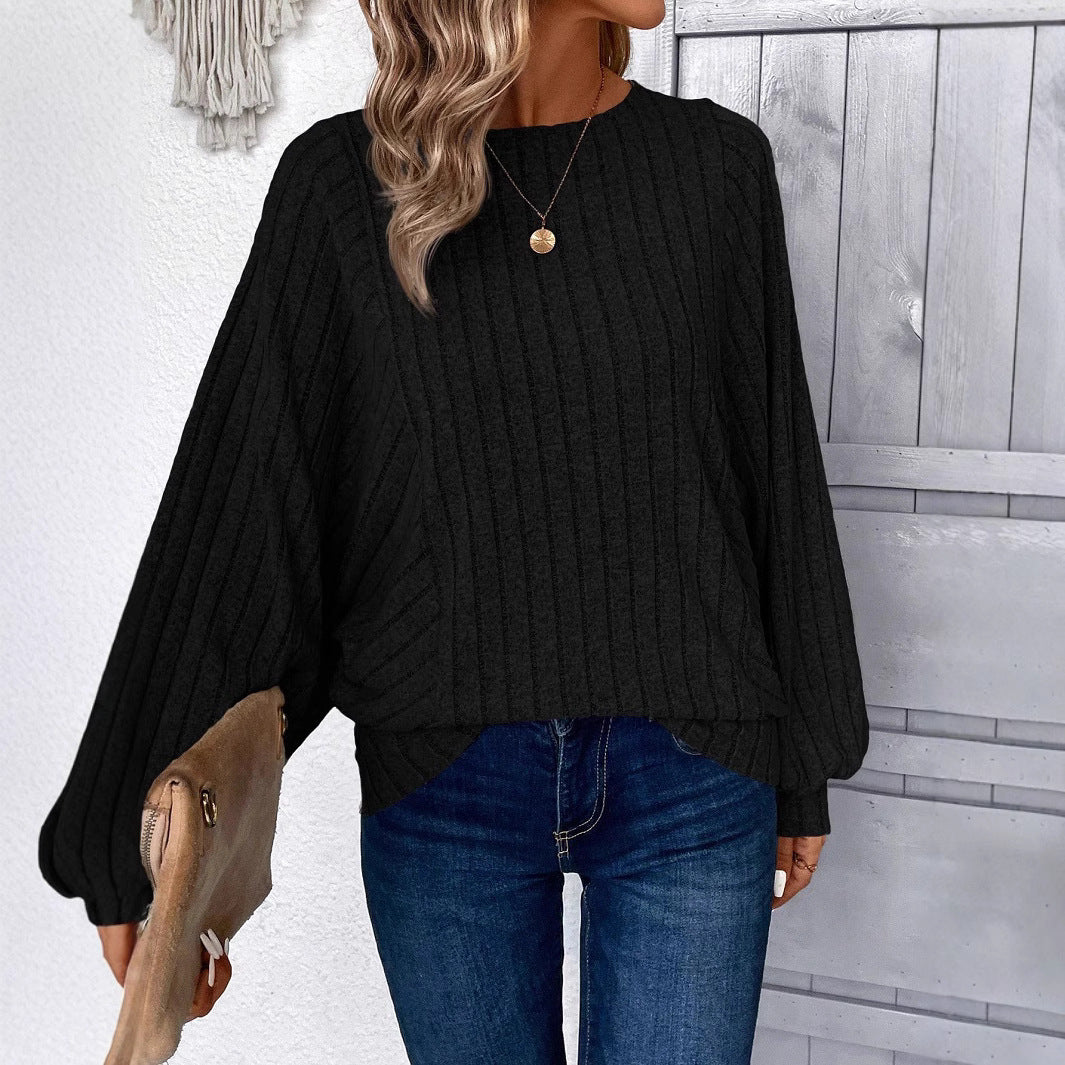 Dame sweater med elegante ballonærmer og ribbestruktur Stilla