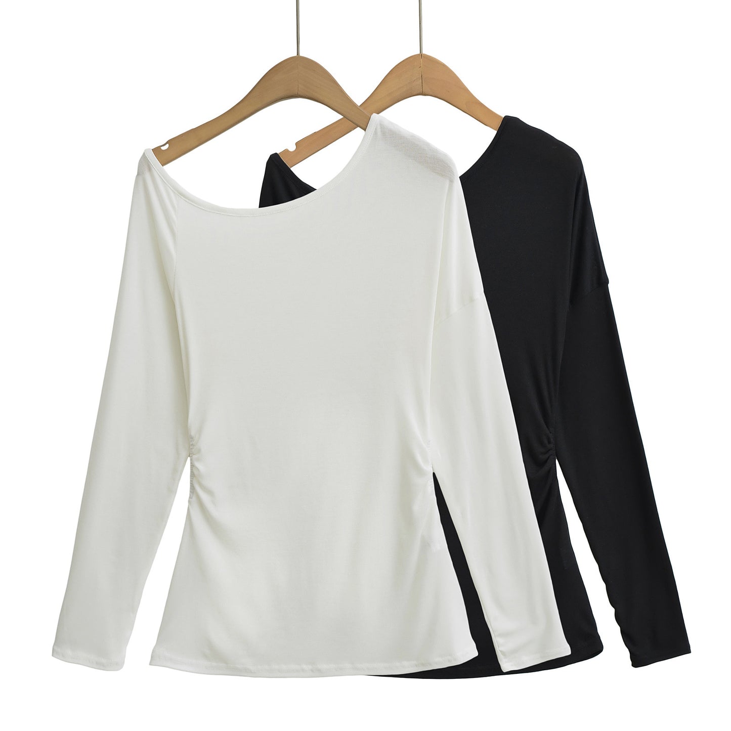 Dame afslappet langærmet top med asymmetrisk skæring og elegant drapering-detalje Stilla