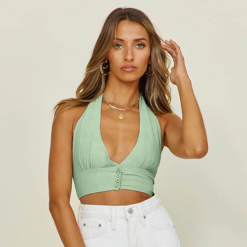 Dame cropped top med dyb udskæring og knapdetaljer Stilla