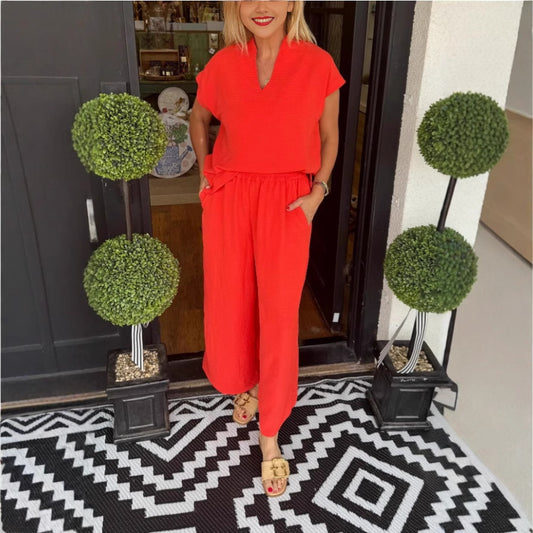 Dame jumpsuit med løs pasform og elegant V-udskæring Stilla