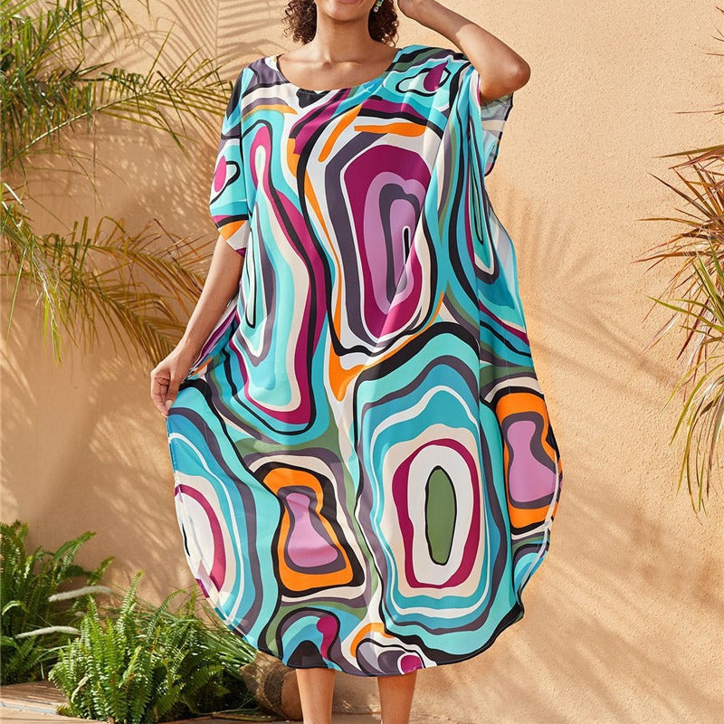 Dame afslappet strandfrakke med kunstnerisk grafisk mønster og generøs snit Stilla