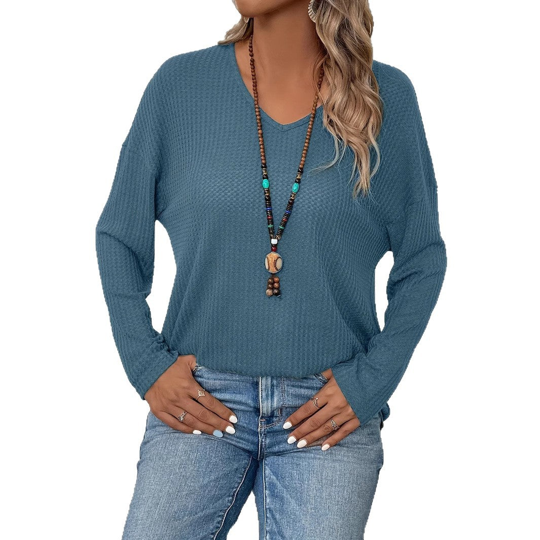 Dame afslappet langærmet top med V-udskæring og vaffelstruktur Stilla