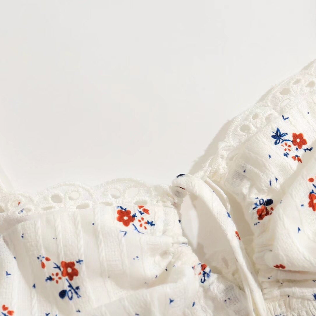 Dame Cropped Spaghetti-strap top med florale accenter og elegant drapering Stilla