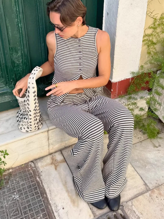 Dame casual jumpsuit med diskret stribemønster og praktiske lommer Stilla