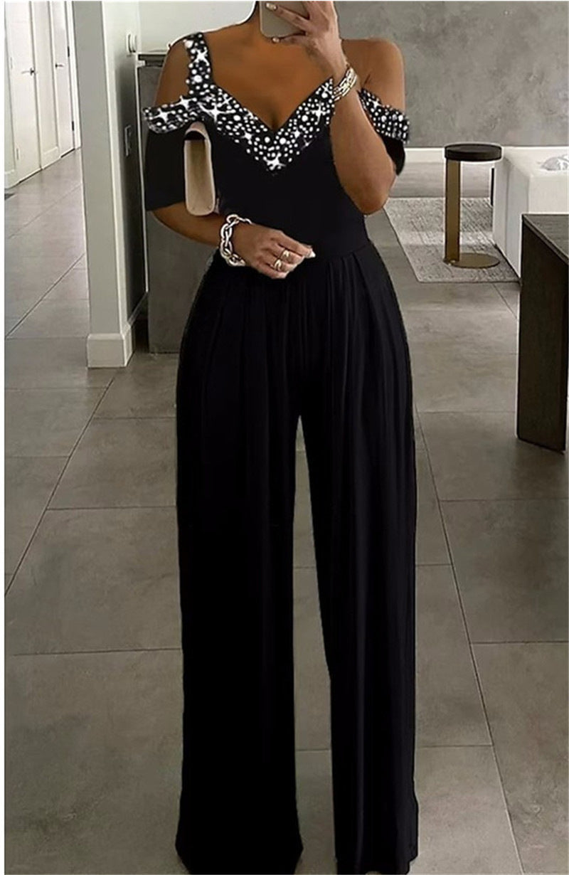 Dame Elegant Jumpsuit med dyb V-udskæring og flæseærmer Stilla