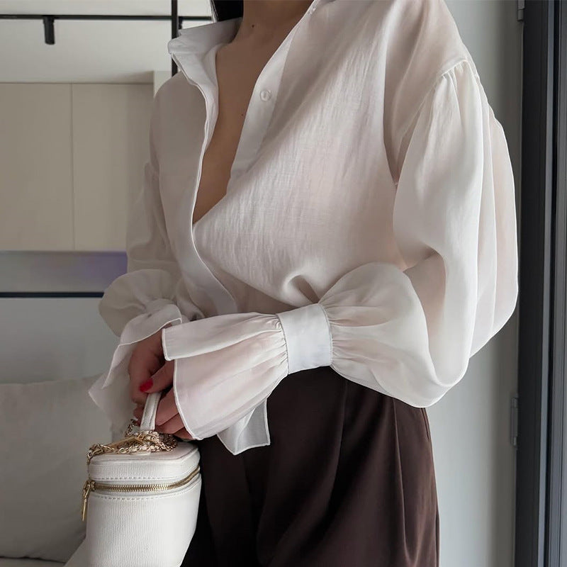 Dame Elegant Bluse med voluminøse Puffærmer og fint Strukturdesign Stilla
