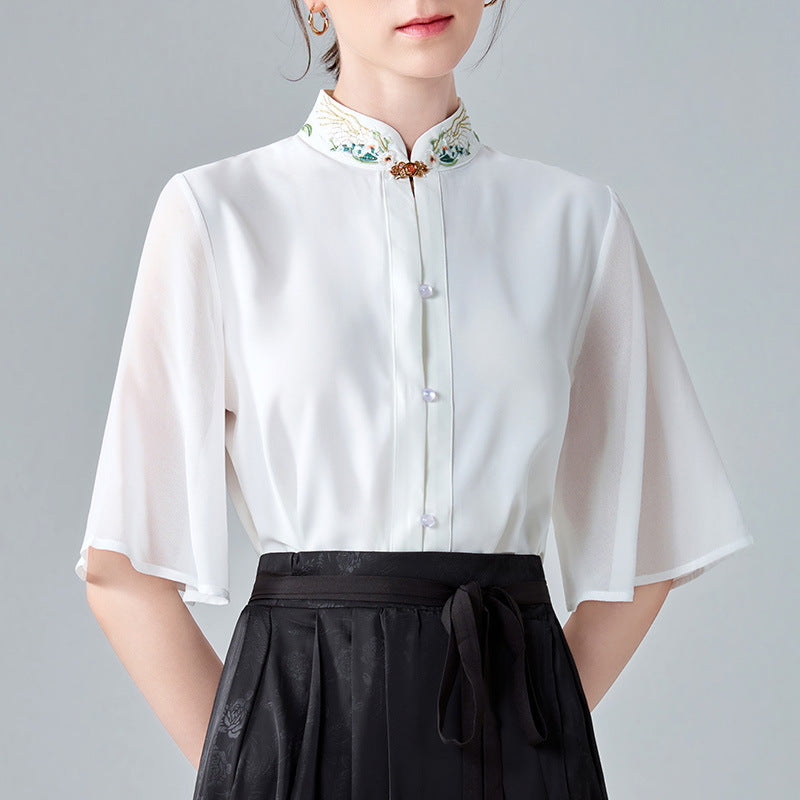 Dame elegant bluse med blomsterbroderier og gennemsigtige ærmer Stilla