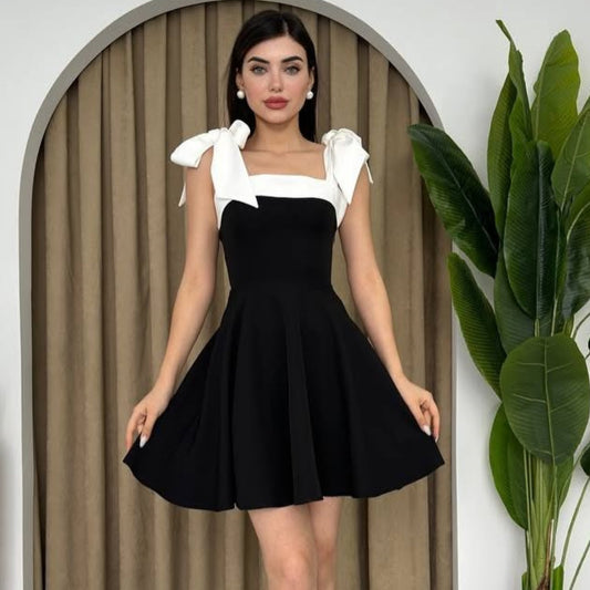 Dame elegant jumpsuit med justerbare sløjfer og dyb udskæring Stilla