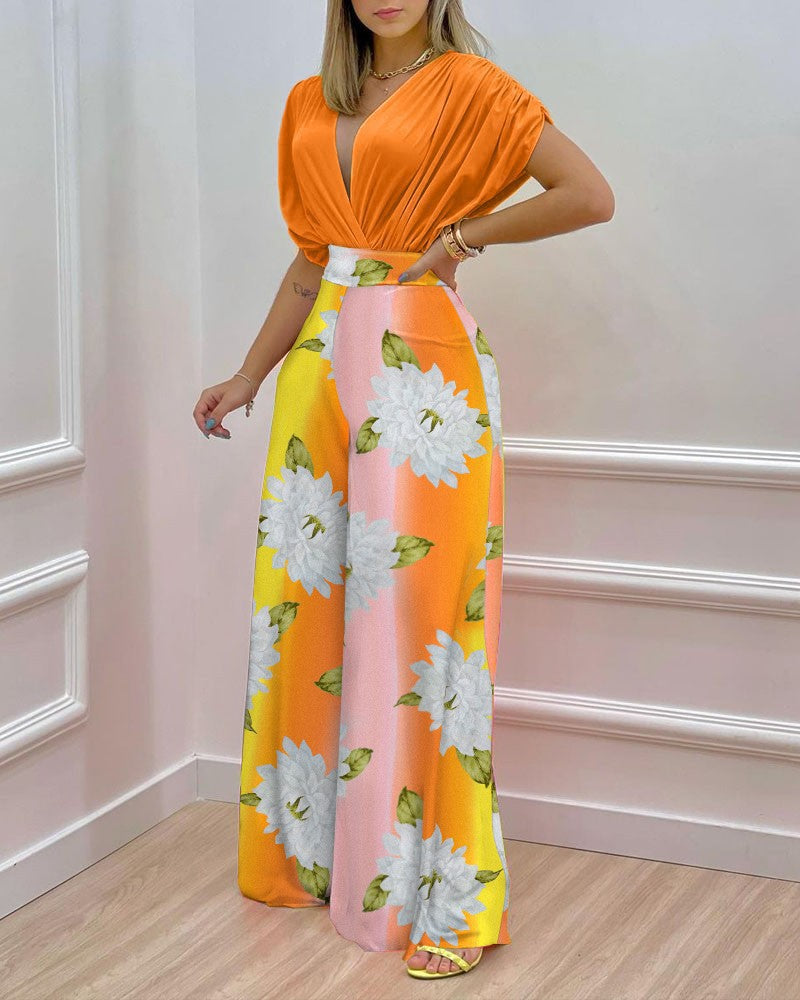 Dame Elegant Jumpsuit med blomsterdesign og dyb V-udskæring Stilla