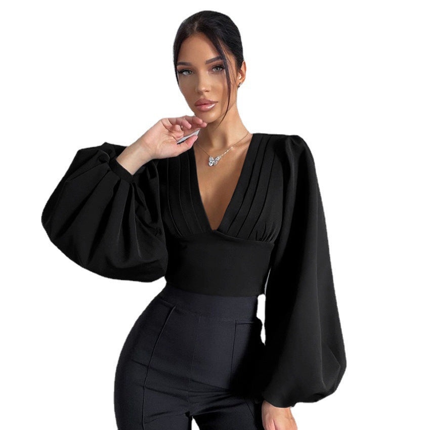 Dame elegant bluse med voluminøse puffærmer og V-udskæring Stilla