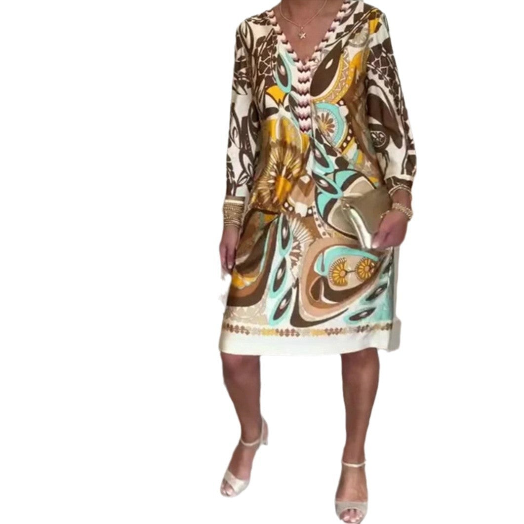 Dame elegant fritidskjole med V-udskæring og farverigt mønster Stilla