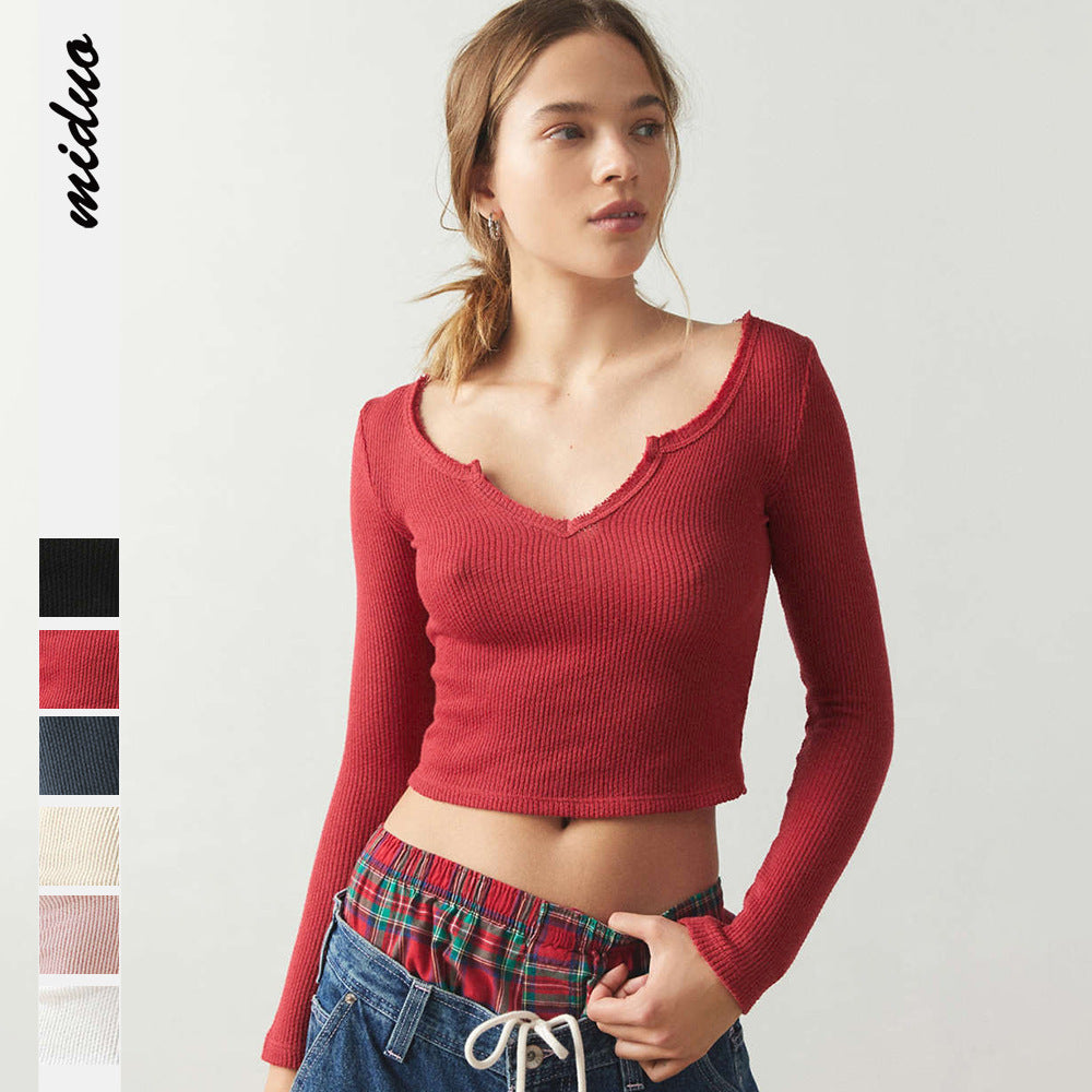 Dame afslappet langærmet rib-top med V-udskæring og fint slidsdesign Stilla