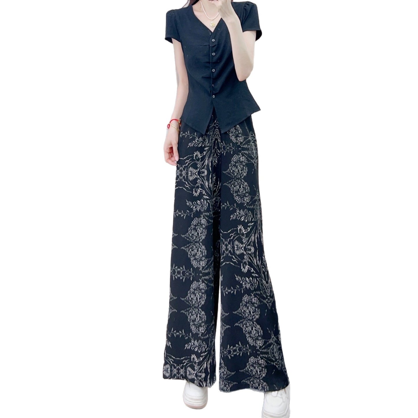 Dame Elegant og figurtilpasset bluse med blomsterprint og bred buksedragt Stilla