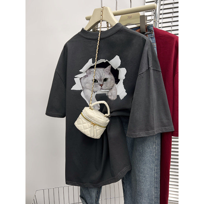 Dame T-shirt med kreativt kattemotiv gennem gennemboret væg Stilla