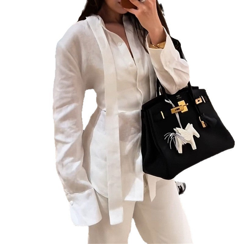 Dame Elegant Bluse med lange ærmer og stilfuldt bånd Stilla