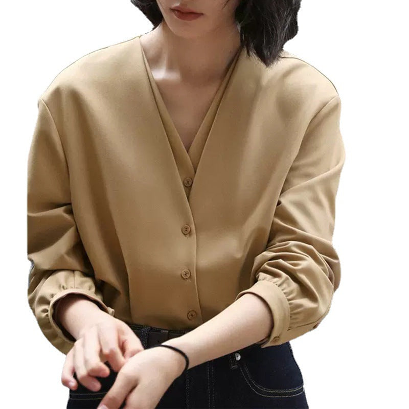 Dame elegant bluse med V-udskæring og knapdetaljer Stilla