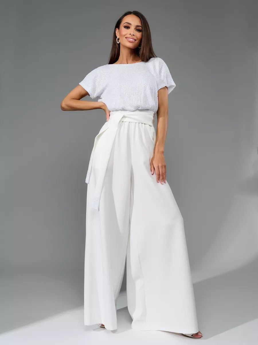 Dame Glitrende Jumpsuit med bredt ben og taljebælte Stilla