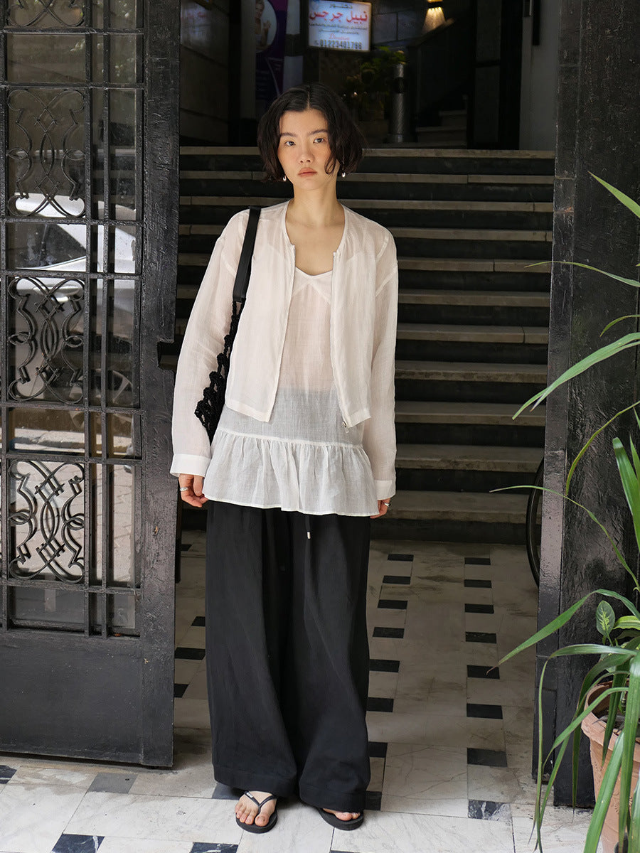 Dame afslappet linned top med svingende kant og raffinerede detaljer Stilla