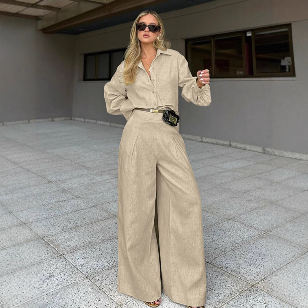 Dame elegant erhvervssæt med figursyet bluse og løst skåret bukser Stilla