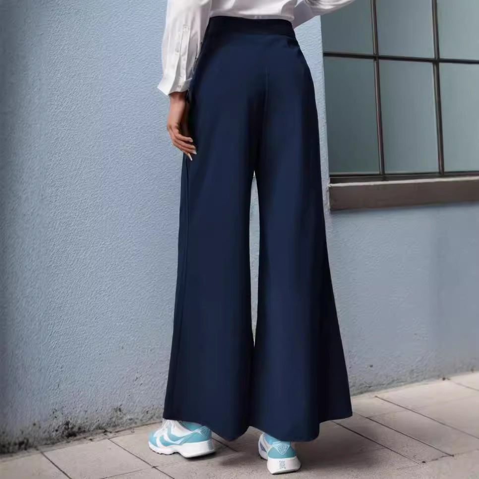 Dame elegant bred buks med praktisk bånd i taljen og sidelufthul Stilla