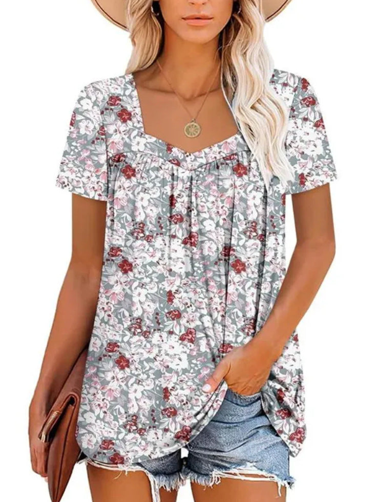 Dame afslappet blomster-top med V-hals og løs pasform Stilla