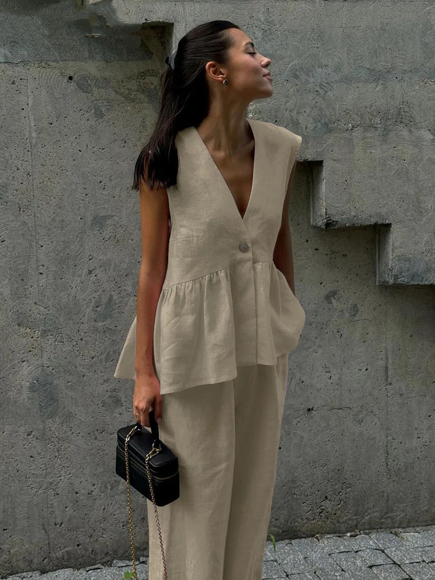 Dame luftig jumpsuit med elegant V-udskæring og taljering Stilla