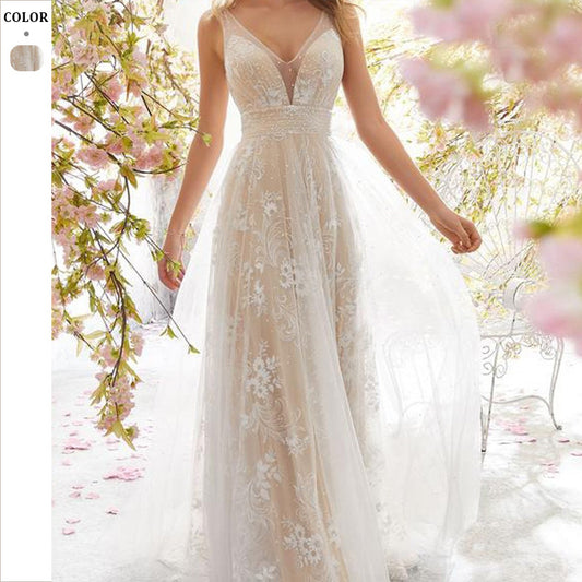 Dame Elegant brudekjole med blomsterapplikationer og gennemsigtig tylldrapering Stilla