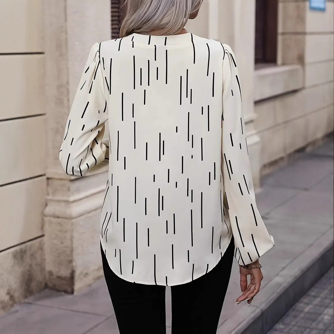 Dame eksklusiv stribet bluse med V-udskæring og ballonformede ærmer Stilla