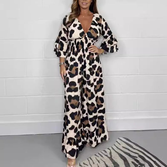 Dame Maxijumpsuit med elegant V-udskæring og flæseærmer Stilla