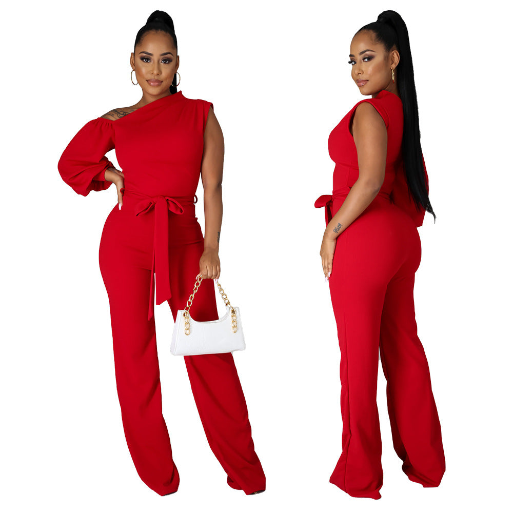 Dame jumpsuit med asymmetrisk snit og voluminøse ærmer Stilla