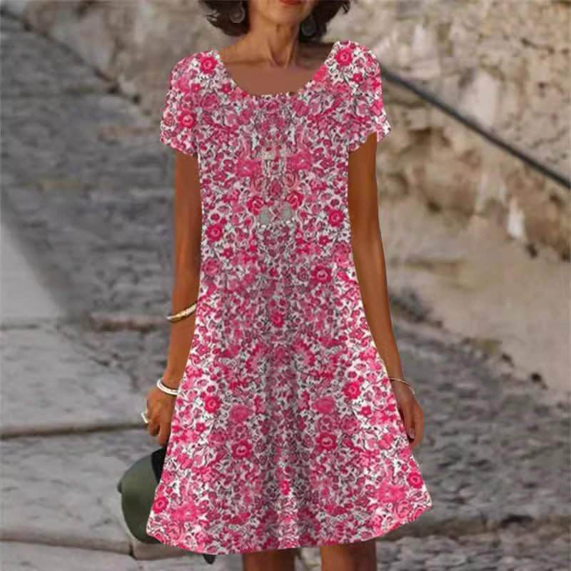 Dame afslappet halværmet kjole med blomstermønster og flatterende snit Stilla