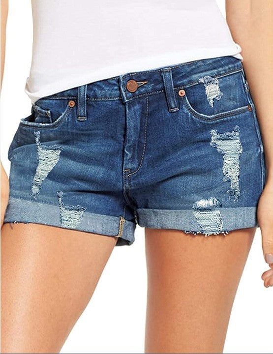 Dame Destroyed Denim-Shorts med omfoldet kant og trendy dekorationer Stilla