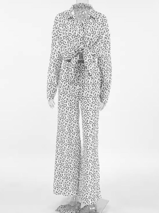 Dame jumpsuit med elegant leopardmønster og tætsiddende bælte Stilla