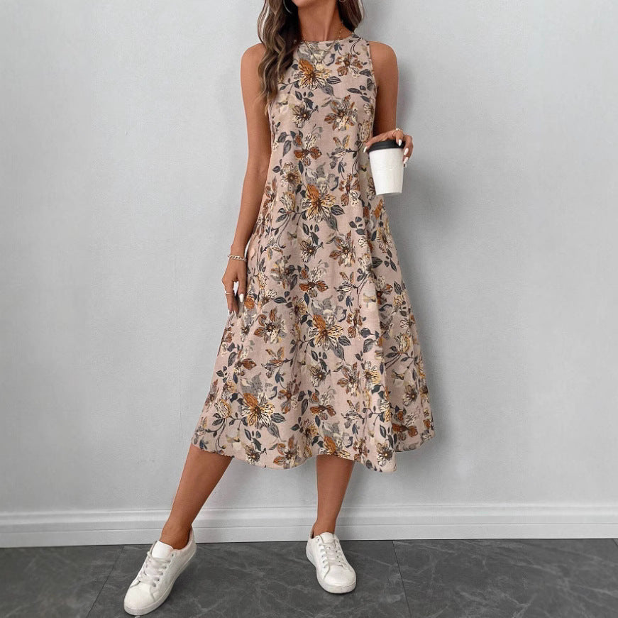 Dame afslappet blomsterkjole med lommer og svajende kant Stilla