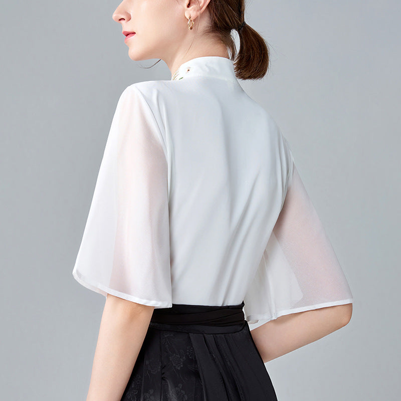 Dame elegant bluse med blomsterbroderier og gennemsigtige ærmer Stilla